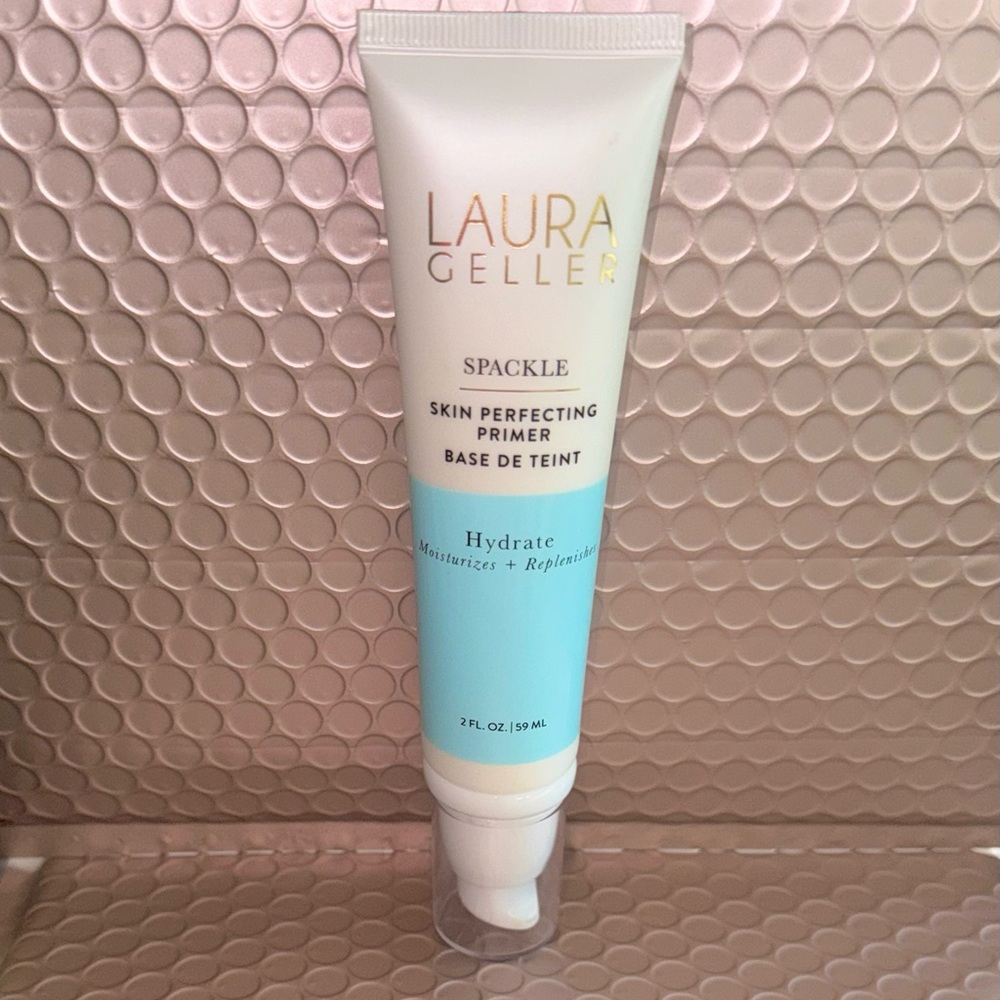 Laura Geller Hydrate Primer with White and Light Blue Design